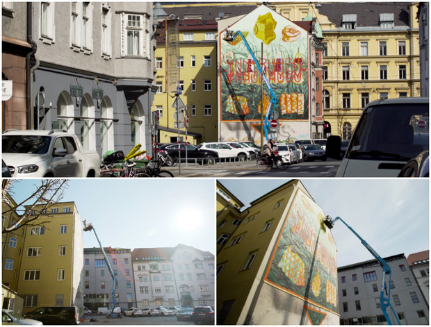 20 Meter über dem Boden: Der Hubsteiger ist für den erfahrenen Street-Art-Künstler längst keine Herausforderung mehr.