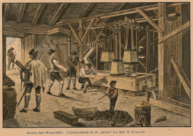 Ein alter Stich aus dem Jahr 1878, auf dem ersichtlich wird, wie das Zerkleinern der Steine im Pochwerk vonstattenging.