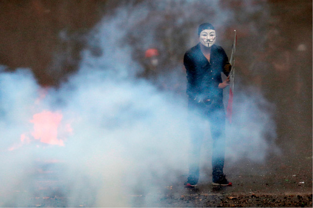Ein Demonstrant mit "Guy Fawkes"-Maske in Chile.